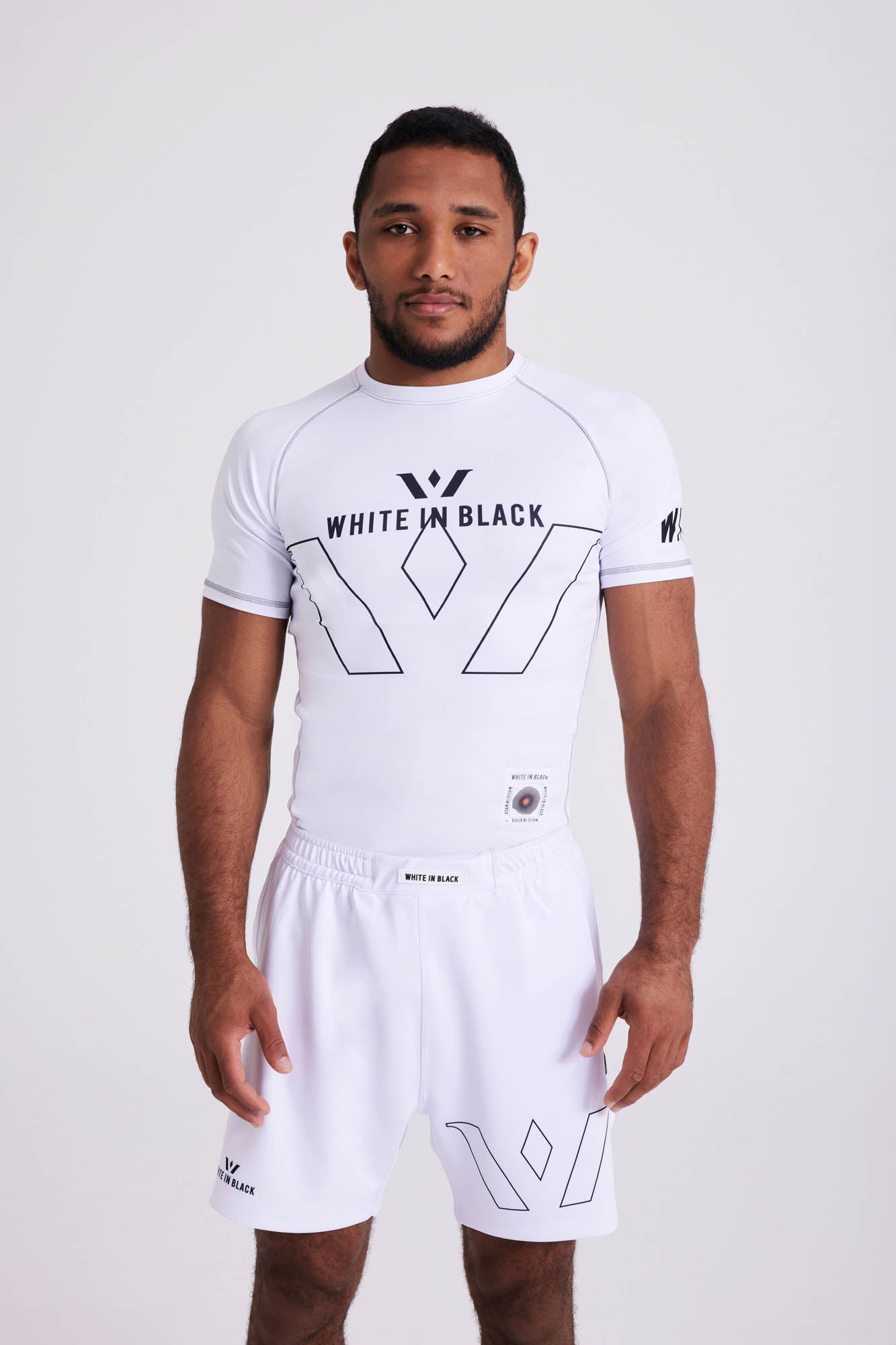 COLL1: White Rash Guard – White in Black