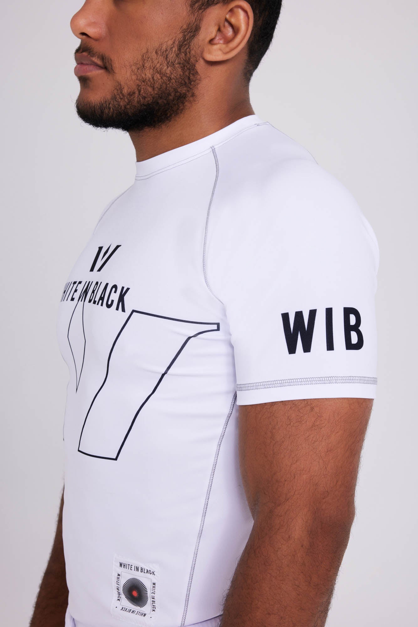 COLL1: White Rash Guard – White in Black