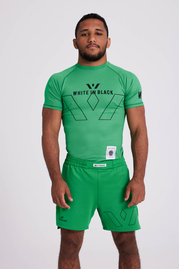 COLL1: Green Rash Guard – White in Black