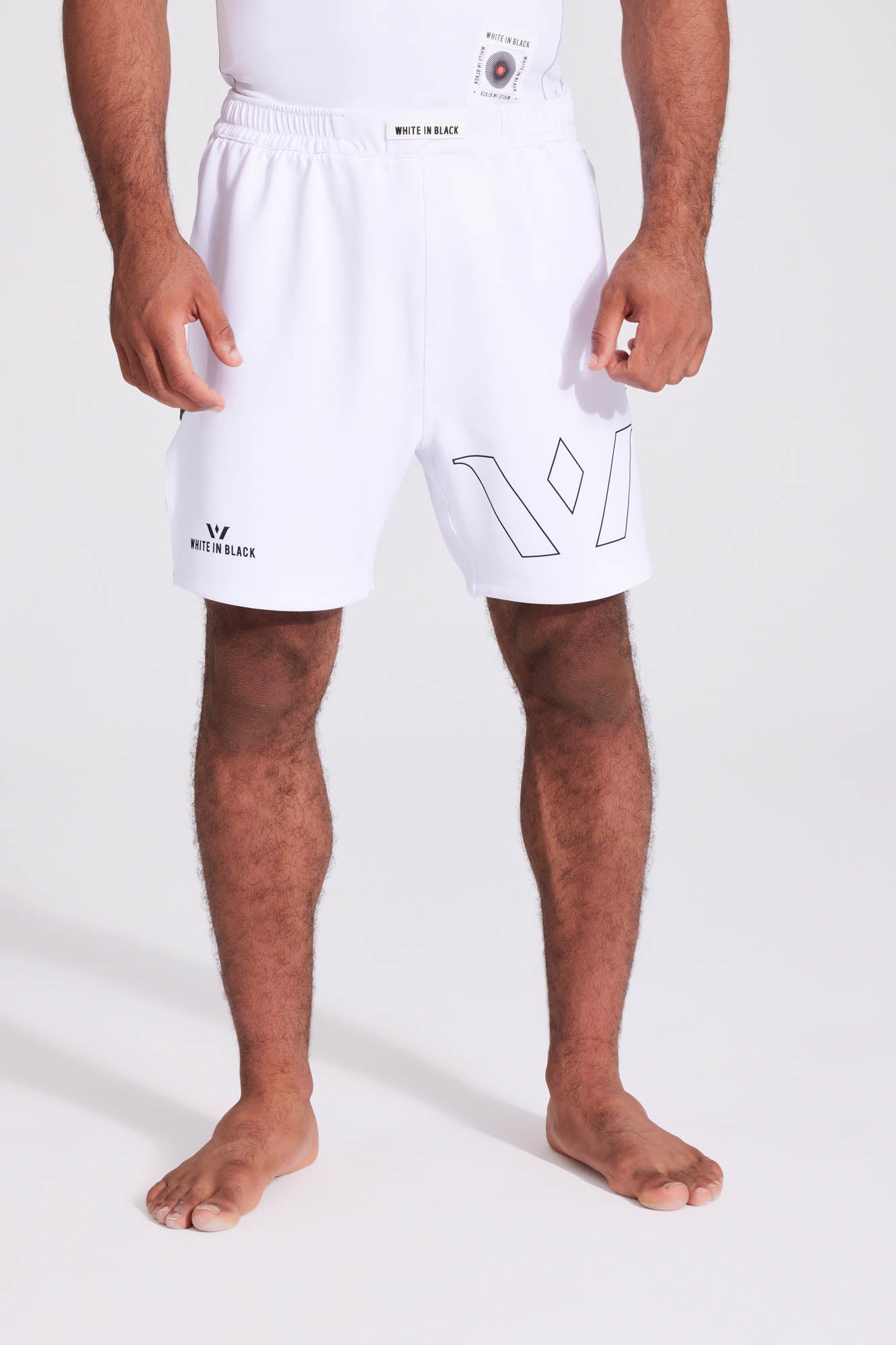 COLL1: White Shorts